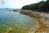 Rocky beach in Rovinj Palud bay