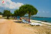 Rovinj Villas Rubin Resort beach Deck chairs under the pines